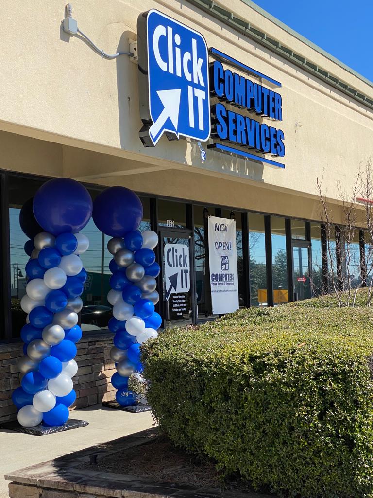 A Click IT Computer Services storefront decorated for opening day