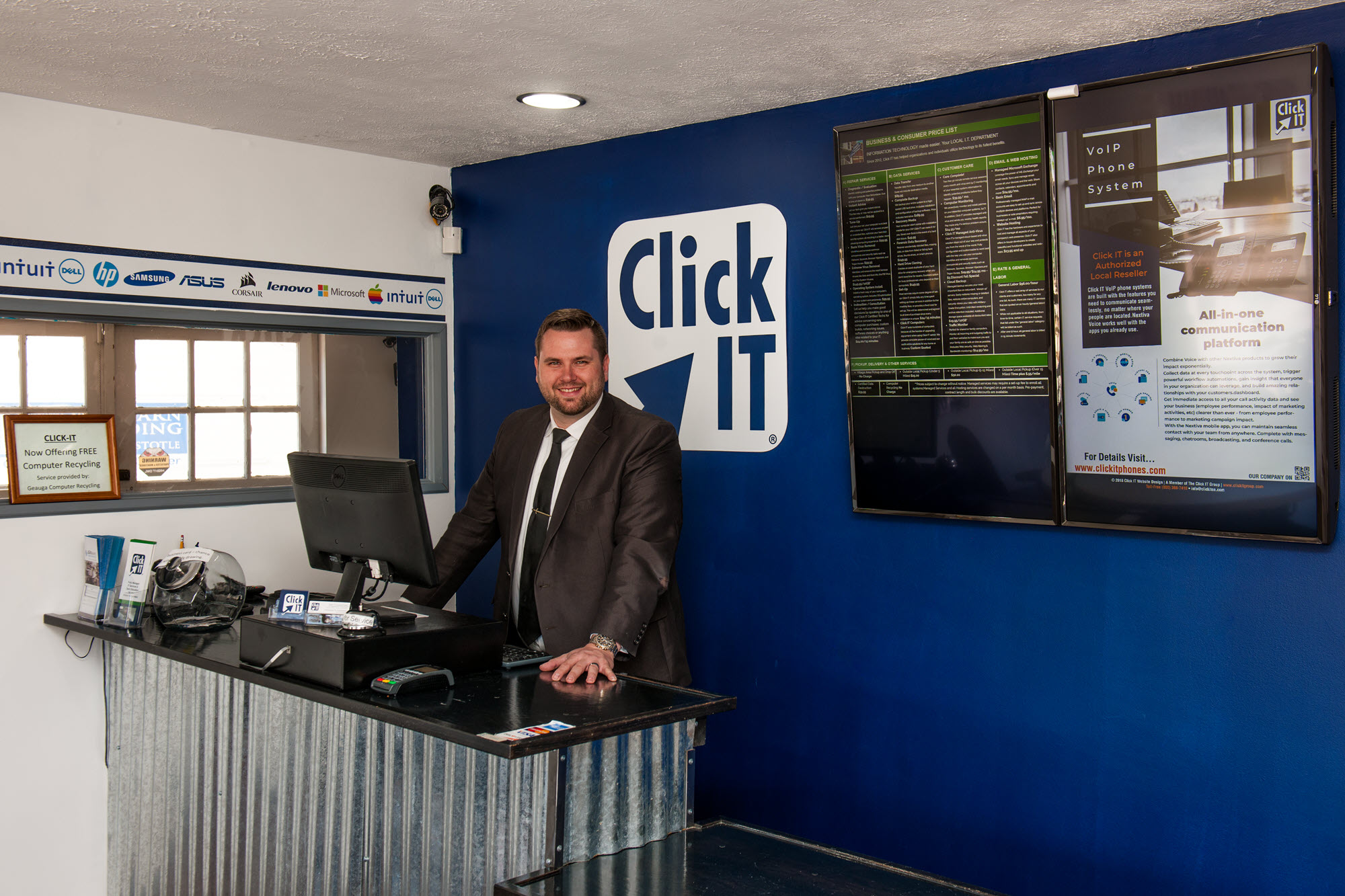 Al Harlow at the front counter of the Click IT store at headquarters